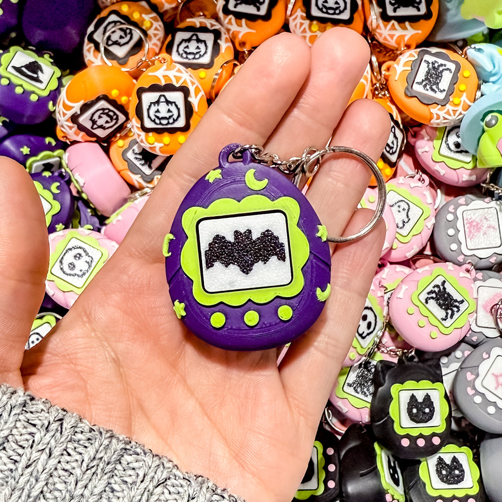 Fidget Clicker Keychain [Purple & Green Sky] Spooky Tamagotchi