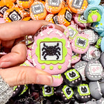 Fidget Clicker Keychain [Pink Bones] Spooky Tamagotchi