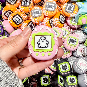 Fidget Clicker Keychain [Pink Bones] Spooky Tamagotchi