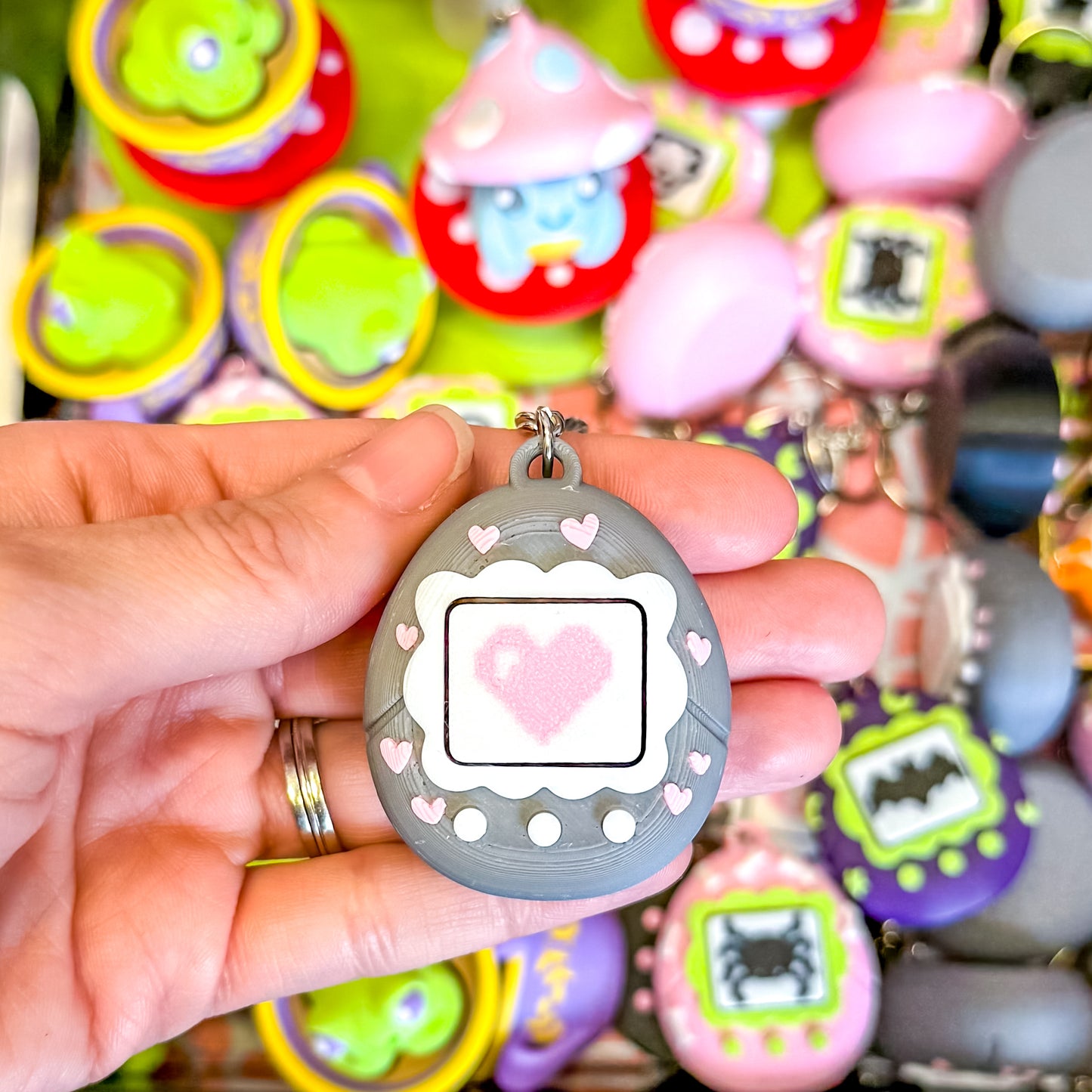 Tamagotchi with Hearts Fidget Clicker Keychain
