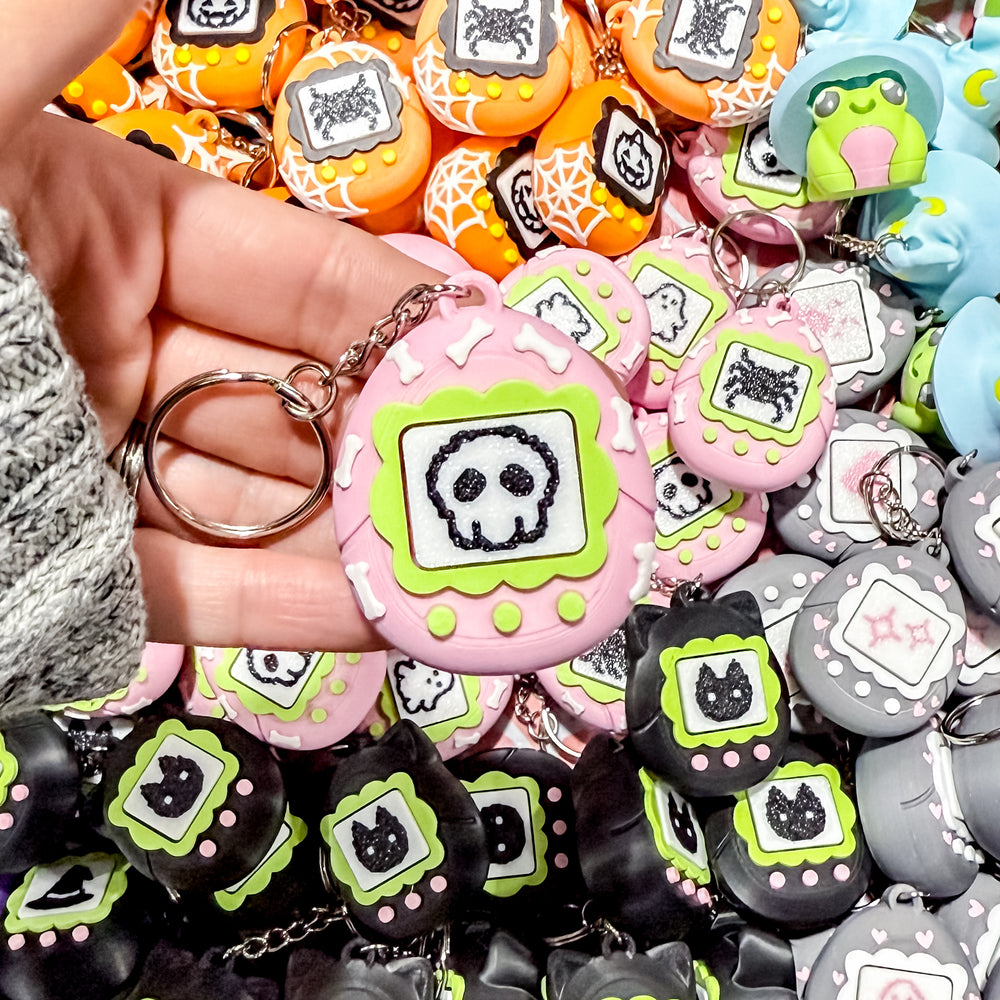 Fidget Clicker Keychain [Pink Bones] Spooky Tamagotchi