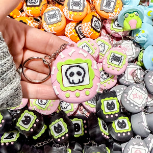Fidget Clicker Keychain [Pink Bones] Spooky Tamagotchi